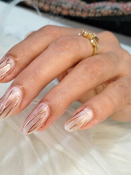 A close-up shot of the elegant rose gold wave design, showing the texture and shine of the chrome lines.