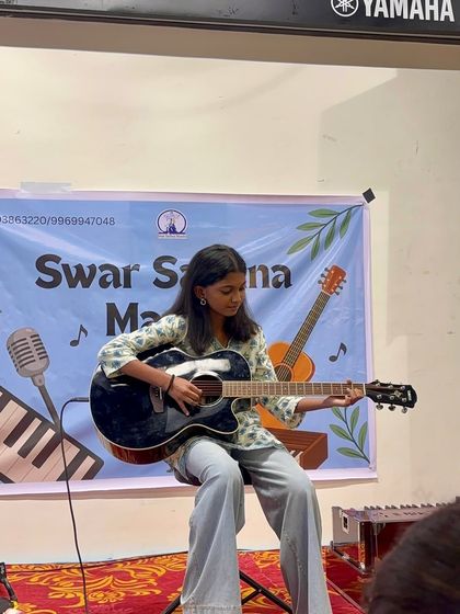 This student brings a classic Bollywood song to life on her guitar. Our curriculum includes learning to play lead guitar for beloved Indian film songs.