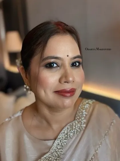 A beautiful portrait that captures her grace and the elegance of the makeup.