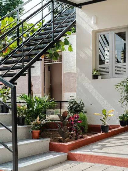 The area beneath the staircase was repurposed into a hardscape garden, adding greenery and life to the circulation space. This detail reflects my philosophy of finding opportunities in every corner of a design to enhance the user's experience.