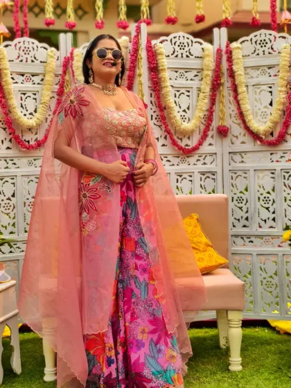 My floral outfit for this Haldi ceremony perfectly matched the beautiful, traditional decor. It's all about creating a cohesive and visually appealing experience.