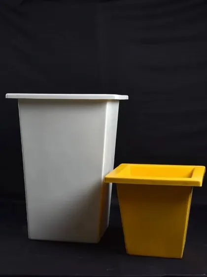 Simple and versatile square fiber planters in white and yellow. These are great for creating uniform, modern plant arrangements.