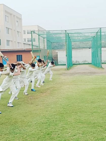 Group batting drills help instill the correct technique across the entire batch of young cricketers.