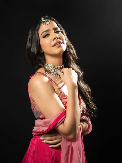 Another angle of this beautiful pink ensemble. The right pose and expression can bring an outfit to life.