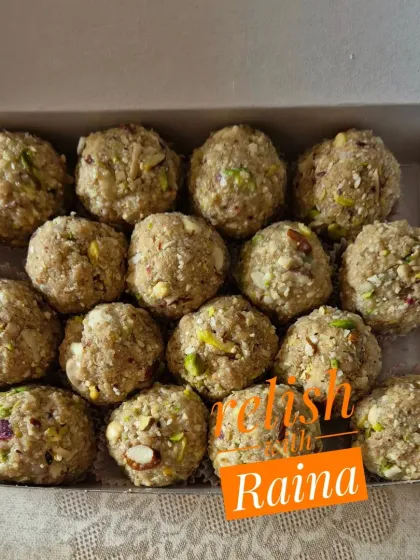 A box of my rich and delicious Oats Makhana Laddoos, packed with almonds, cashews, and pistachios.