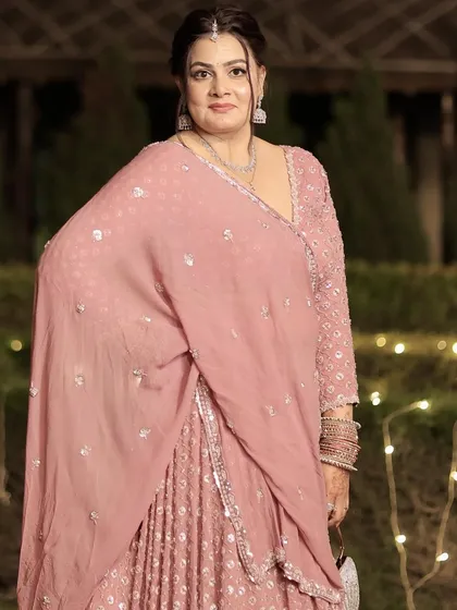 An elegant party look for a mature client. The makeup is soft and flattering, enhancing her natural grace and beauty.