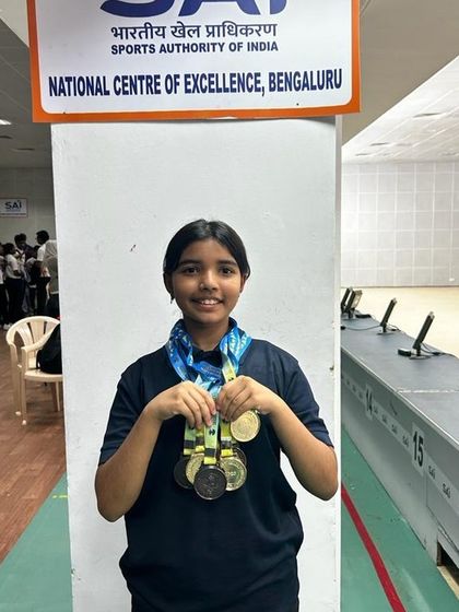 Our shooter celebrating her victories at the National Centre of Excellence, Bengaluru, after qualifying for Zonals and Pre-Nationals.