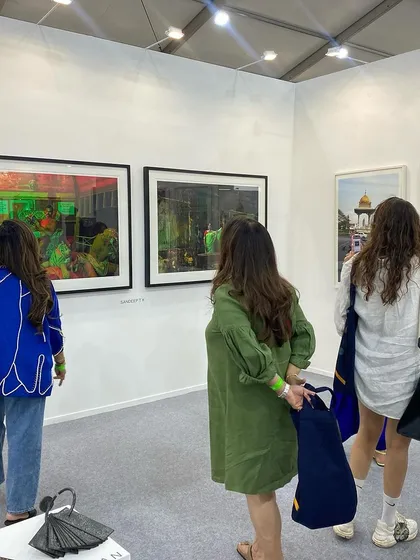 Visitors viewing the large photographic prints at our booth.
