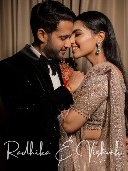 A romantic portrait of the couple at their reception. Their close embrace and happy smiles perfectly capture the love and joy of the occasion.