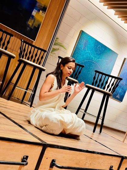 Speaking at an event, sharing my journey and the philosophy behind my practice. These opportunities allow me to connect with a wider audience.