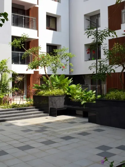 At Sona Vistaas, I used strategic landscape insertions to enhance the microclimate and spatial cohesion. These green pockets, featuring large planters and seating, redefine the boundary between the built and unbuilt, creating a more comfortable and visually appealing environment.