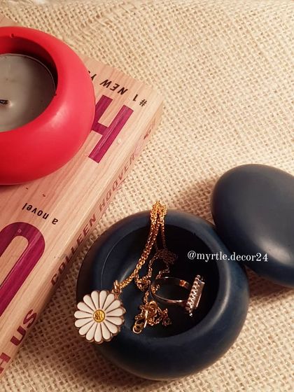 Our mini jar with a lid is a multi-functional piece. It can be used as a T-light holder as shown here, or with the lid on, it becomes a perfect little pot for storing jewelry.