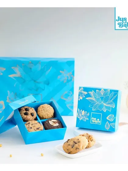 Our 'Mini Celebration Box' filled with assorted cookies is a wonderful and simple gift for Diwali. It's a small package that brings big smiles.