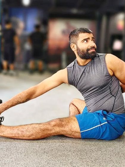 A seated spinal twist combined with a hamstring stretch. This pose, Marichyasana, not only improves flexibility but also aids in digestion and detoxifies the internal organs.