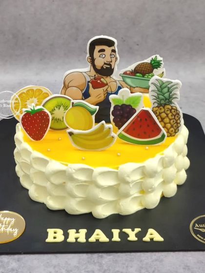 A fresh mango cake for a fruit lover, personalized with a fun caricature of the birthday boy.