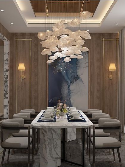 This angle shows the dining room's connection to the rest of the home. The wood paneling and gallery wall are reflected in a mirrored surface, adding depth and complexity to the design.