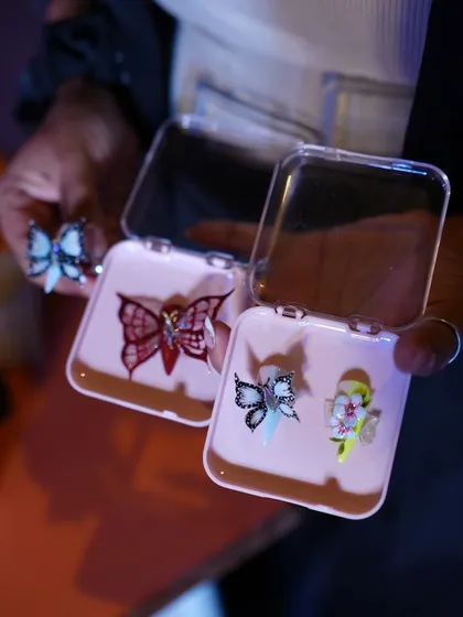 These are some of the 5D butterfly and flower pieces I created during a live stage demonstration. They are crafted separately and then applied to the nail, allowing for incredible detail and artistry.