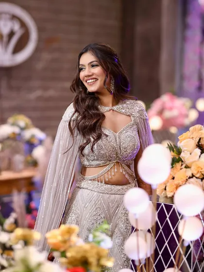 The perfect Sangeet smile. Her makeup was designed to be both glamorous and comfortable, allowing her to enjoy her night to the fullest while looking absolutely radiant.