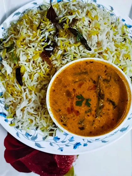 A serving of my Bagara Rice with a side of mixed vegetable kurma. A classic and comforting combination.