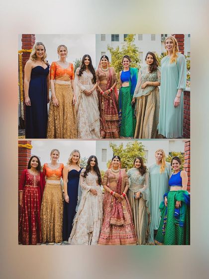 A group photo of the bride with her diverse group of friends and bridesmaids from different cultural backgrounds.