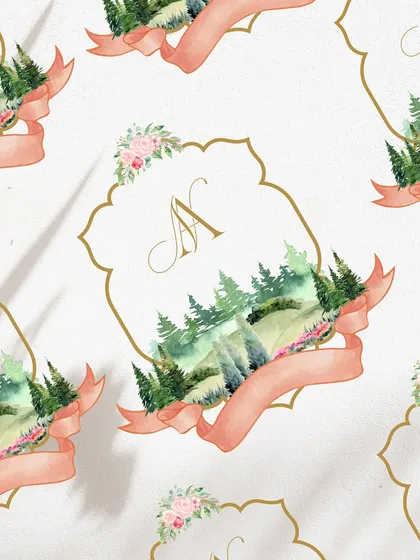 I love incorporating artistic styles into my designs. This monogram features a beautiful watercolor landscape of a forest nestled within a classic crest, creating a romantic and imaginative emblem for a nature loving couple.