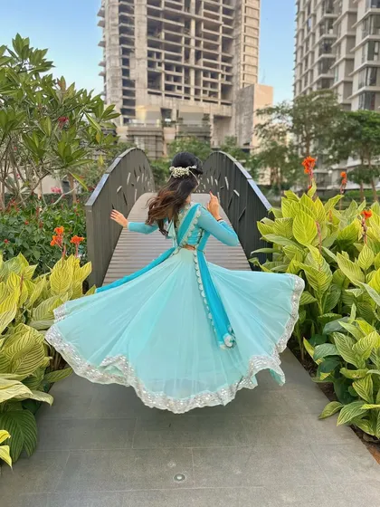 A series of photos capturing the twirls and graceful movements of semi-classical dance. The flow of the lehenga is essential to the visual beauty of this style.