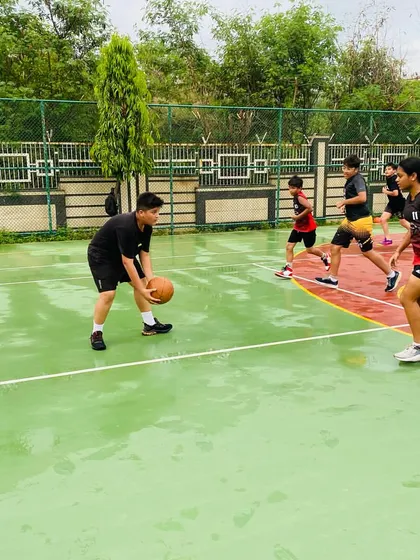 A player practices dribbling.