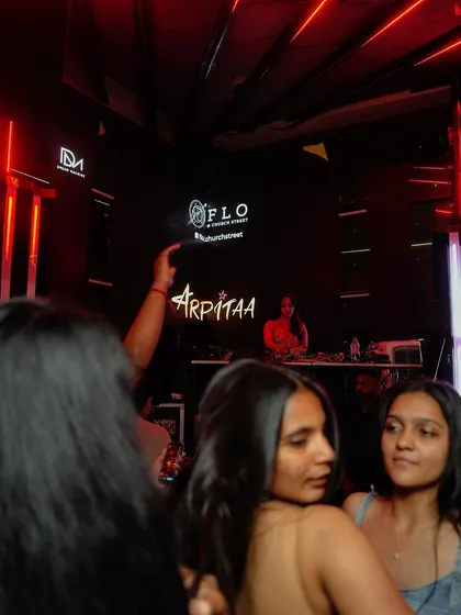 A shot from the dance floor looking towards the DJ booth at FLO. My name is up in lights as I spin tracks for the crowd enjoying their night out.