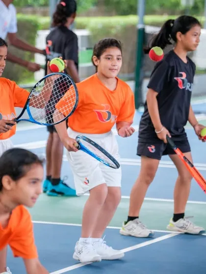 The journey to tennis excellence starts with fun. Our junior program uses engaging group drills and softer balls to build a strong foundation in a positive and encouraging environment, making sure every child develops a love for the game.