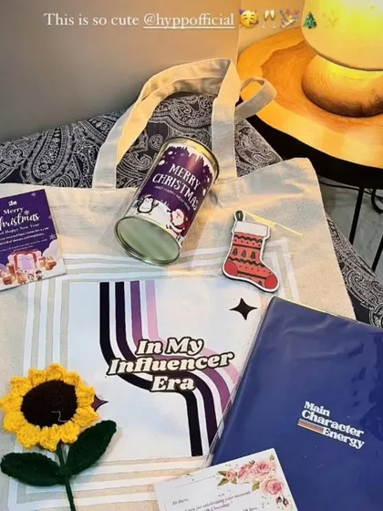 The contents of the collaboration hamper, including the custom tote bag and other branded goodies.