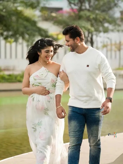Photography is also about telling personal stories. This is a candid moment from a maternity shoot with actress Aditi Prabhudeva and her husband, capturing their joy in a natural, outdoor setting.