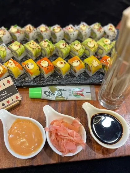 For a Diwali cards night, I created this platter of colorful vegetarian sushi. This demonstrates how I can blend Pan-Asian cuisine with a traditional Indian festival, using custom labels to tie into the party's theme.