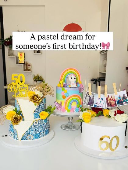 A table full of pastel dreams, from a first birthday cake to a 60th celebration cake with family photos.