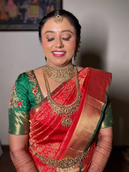 A bridal glow that feels eternal. Pooja looks like a divine South Indian bride, draped in tradition and dipped in gold.