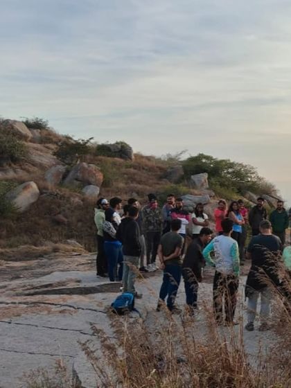 The group listening to instructions before starting the final ascent to the sunrise point.