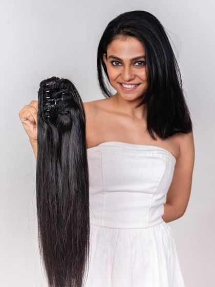 This is our clip hair clutch ponytail, an easy way to get a long, full ponytail in seconds. It's made from real human hair, so you can style it to match your own.