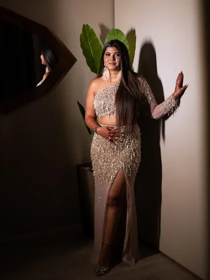 This is what I call effortless glam. For her reception, we created a dramatic look with a smokey eye and contoured features, all while keeping her skin looking fresh and dewy. It's about looking like a star without feeling weighed down by heavy makeup.