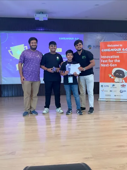 Team Climate Defender receiving their Consolation Award at the Codeavour Nationals. Their 4th place finish in a tough category was a great achievement.