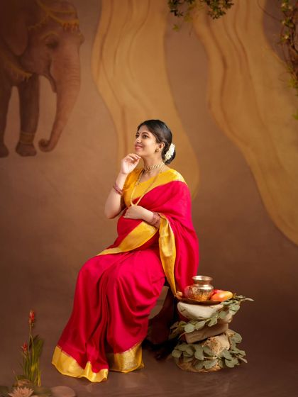 A thoughtful and dreamy solo portrait, with the mom-to-be looking up as if imagining the future.