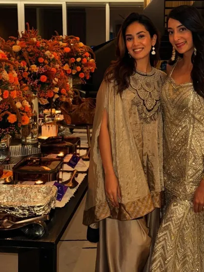 A closer look at Mira Kapoor in the Prisho umbrella kurta set. The intricate black and silver embroidery on the cape is a beautiful detail.