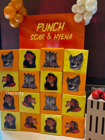 A straight-on shot of the "Punch Scar & Hyena" activity, showing the colorful character blocks and boxing gloves ready for action.
