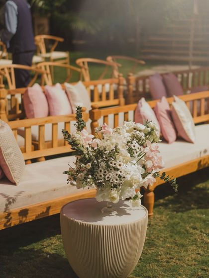 A soft floral arrangement in a simple vase, showing that even the smallest details are thoughtfully curated.