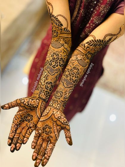 The complete look for this bride, with both arms beautifully adorned.