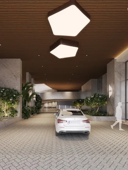 The driveway entrance to the Malabar Hill project offers a new standard of luxury urban living. The design integrates green spaces with a covered drop-off area, providing a seamless and elegant arrival experience.