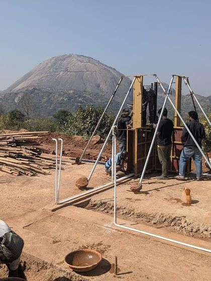 My team at work on the rammed earth formwork for the Unnathi Farm pavilion, a labor-intensive process that results in strong, beautiful walls.