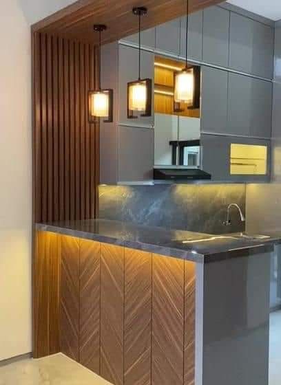 Bengaluru Interiors - Space-Saving Furniture Solutions Modern Kitchen Designs photo 23