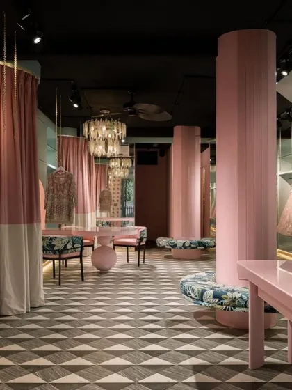 In this fashion studio, we translated the brand's identity into a physical space. The interplay of soft pinks, geometric floors, and custom furniture creates a narrative environment that is both a functional retail area and a living embodiment of the brand's story.