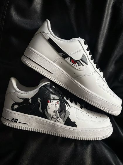 A dynamic shot showing both the outer portrait and inner swoosh design of the Itachi custom sneakers.