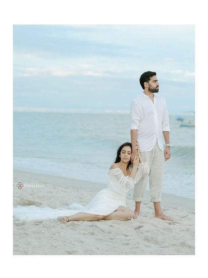 An artistic and soulful portrait on the sand in Thailand. The composition creates a sense of calm and introspection, telling a deeper story of their bond.