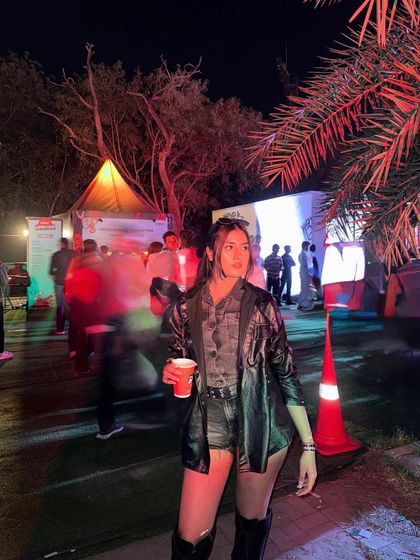 A candid moment in the middle of the festival grounds.